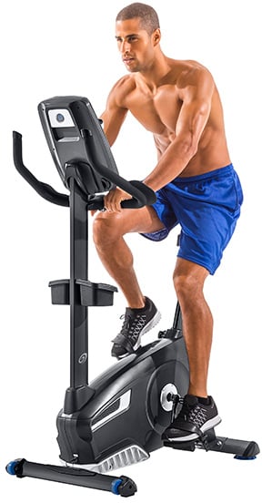 man on a Nautilus upright exercise bicycle